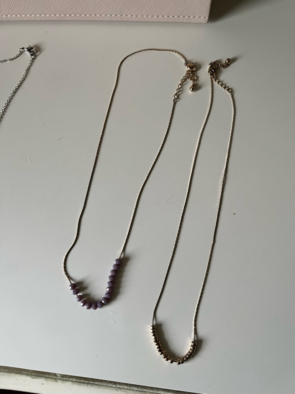 Gold necklaces with beads